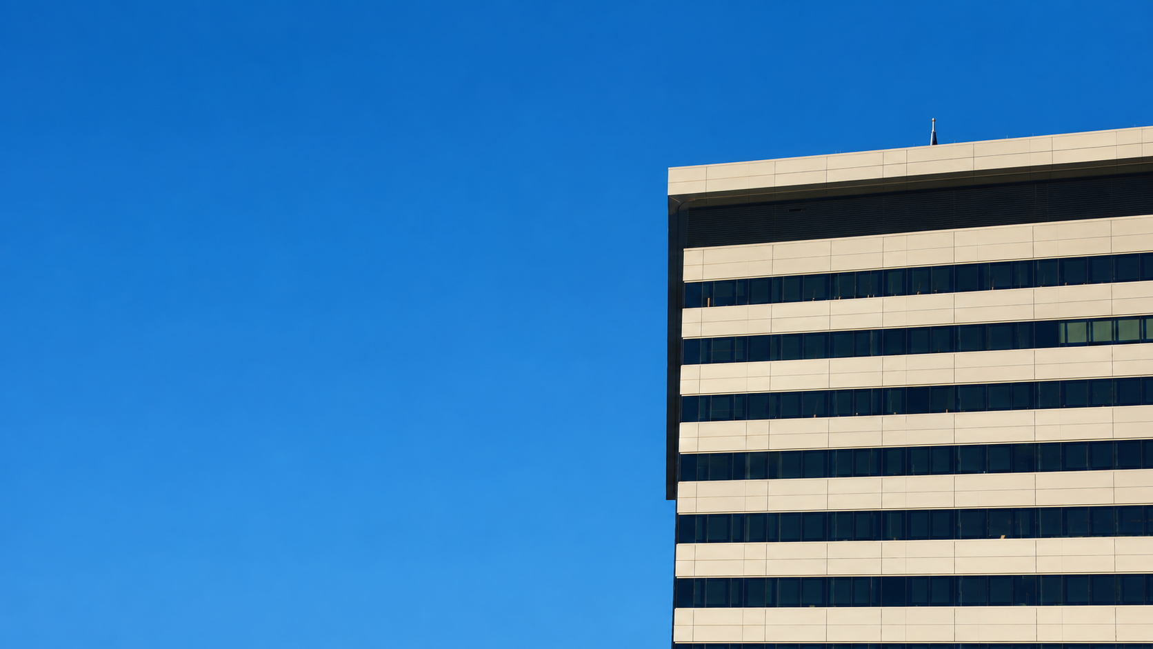 Modern architecture against a clear blue sky